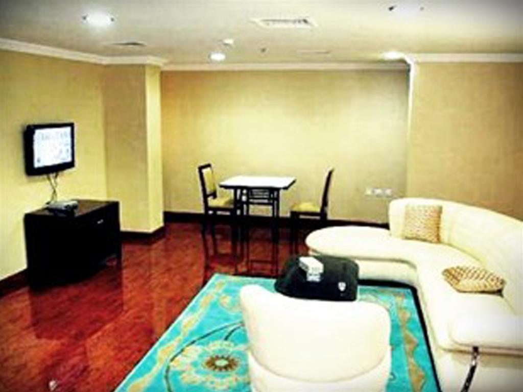 Qairawan Hotel Apartments Доха Номер фото